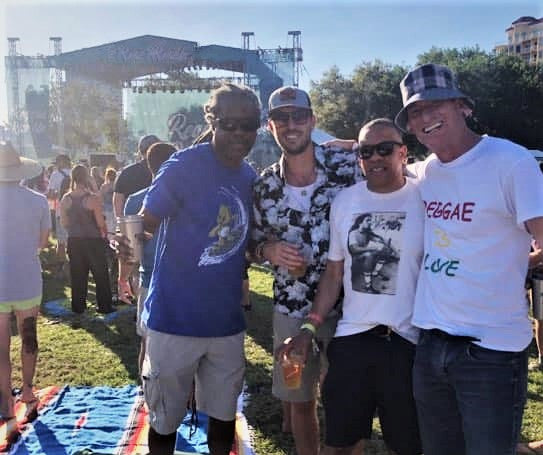 "Feel the Positive Vibes: A Guide to Reggae Music Festivals in America and Stylish Apparel from Irie Tees"